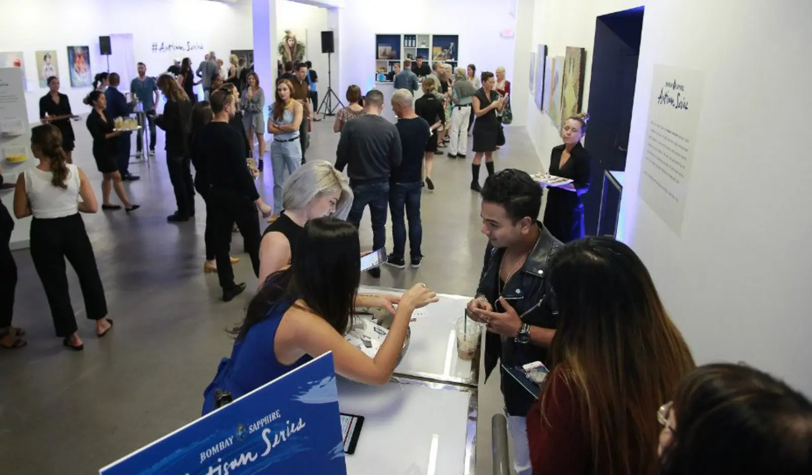 Visitors gathered at the Artisan Series exhibition
